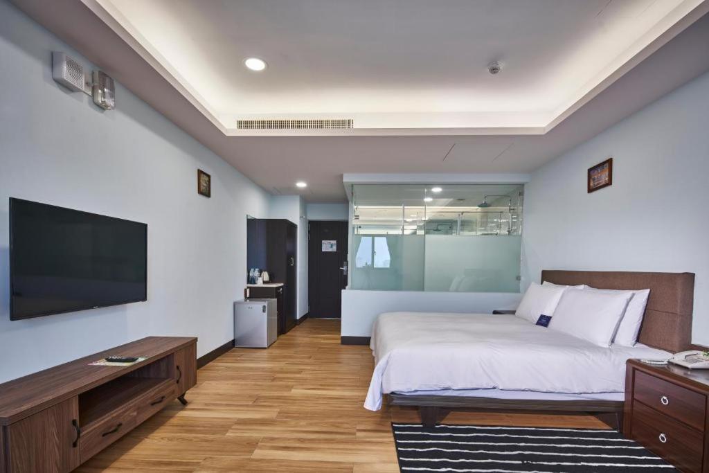Menippe Hotel Kaohsiung Habitación foto